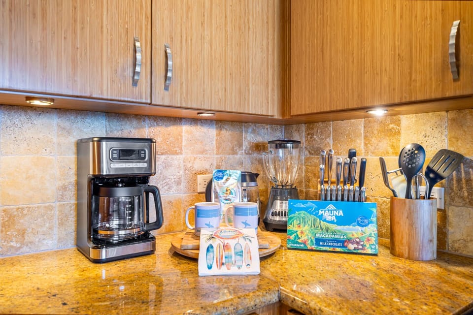 Drip Coffee Maker with reusable Gold Filter, Ground Coffee & Filtered Water Pitcher provided.