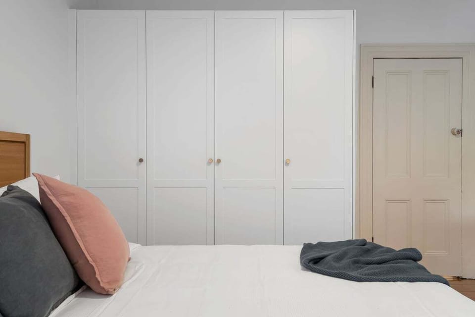 Spacious bedroom featuring built-in closet space and a cozy, comfortable feel.