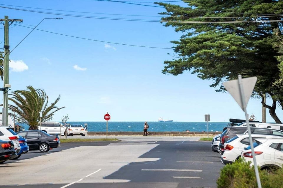 Open-space parking area offering wide, easy access and convenient vehicle maneuvering in a spacious setting.