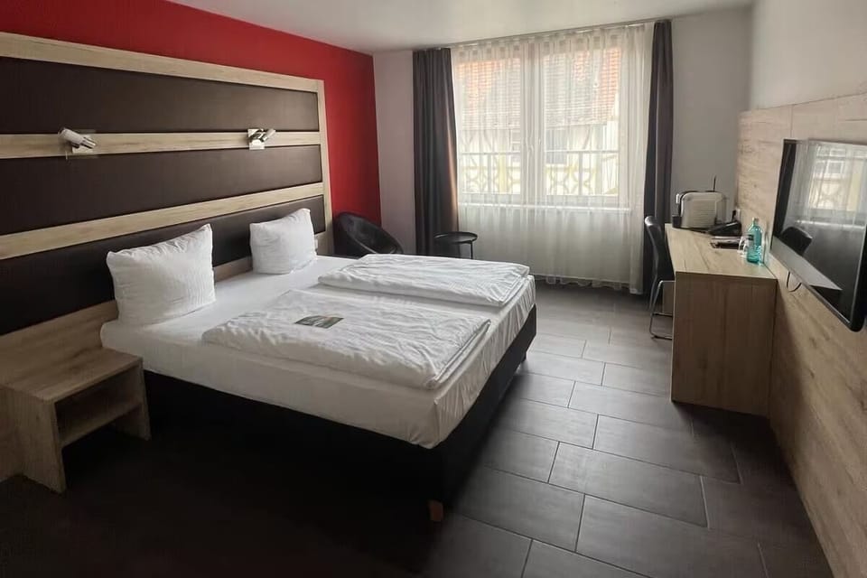 Relax in the same cozy bedroom setup from another angle.