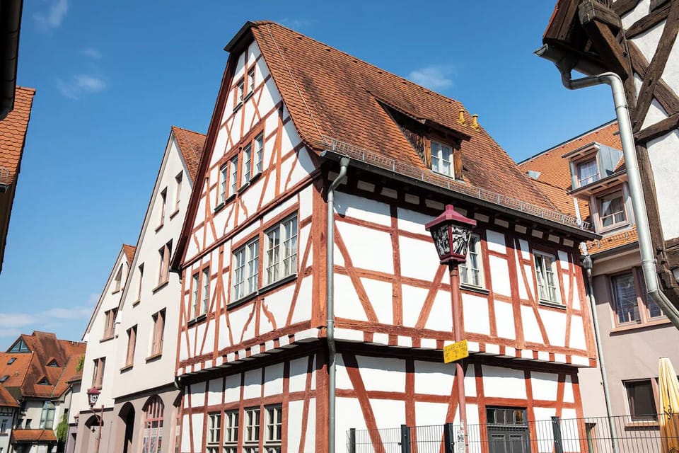 Step outside to a picturesque historic façade under blue skies.