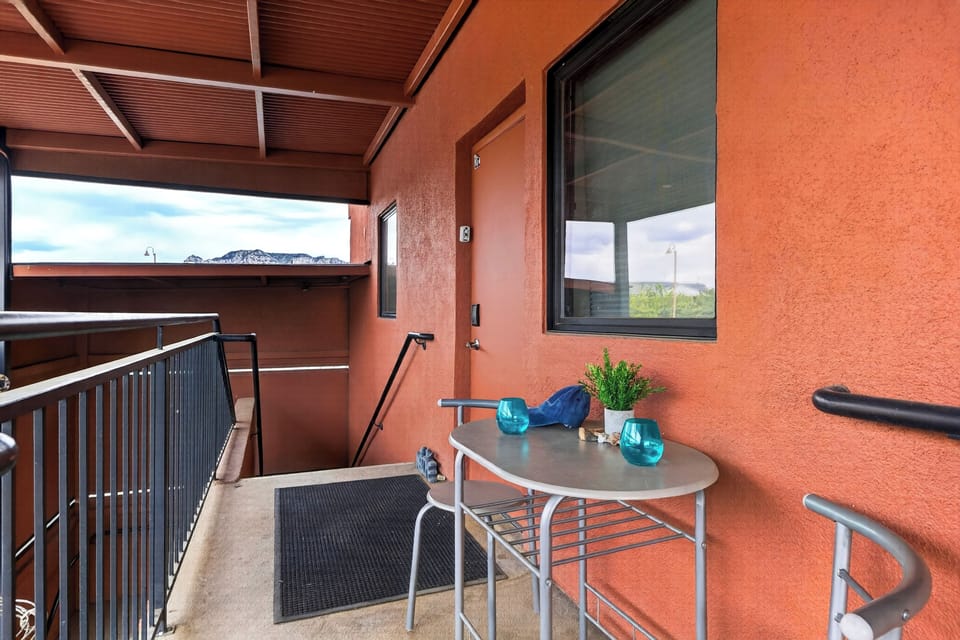 Sip your morning coffee on the shared outdoor hallway while taking in stunning Sedona red rock views.