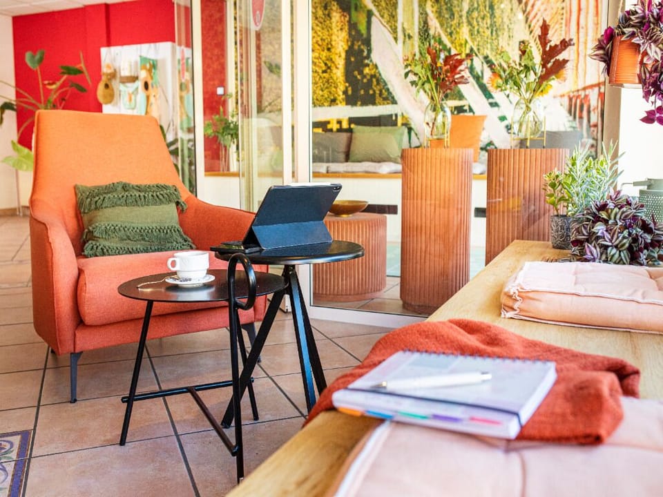Sip coffee, journal, and linger in a cozy corner nook.