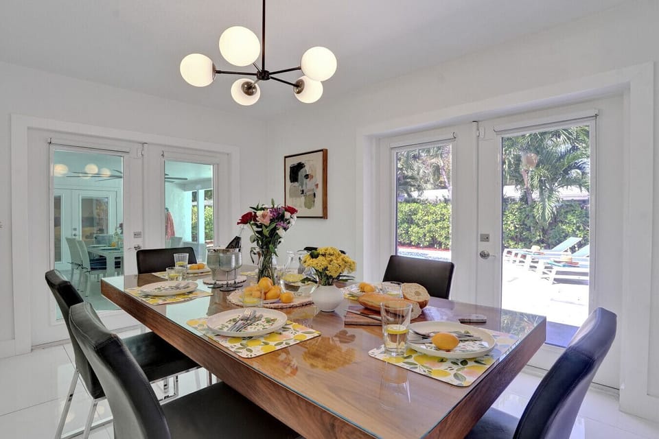Warm dining space featuring a spacious wood table and cozy chairs—perfect for shared meals