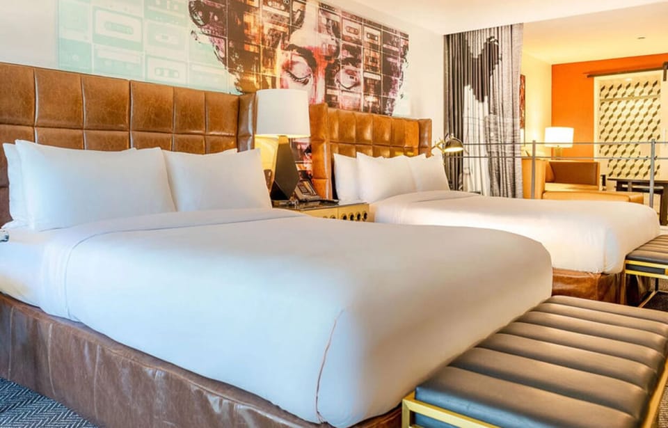 Stretch out with two beds and striking artistic style.