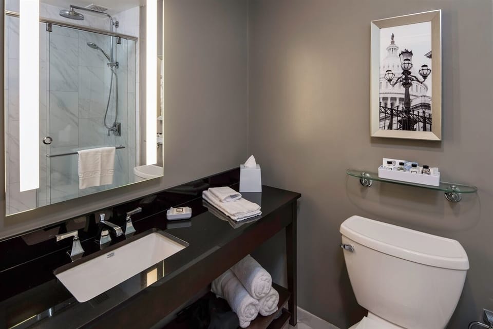 Get ready comfortably with bright lighting and generous counter space.