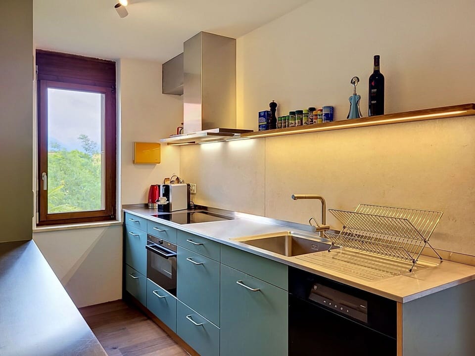 Kitchen, Countertop, Interior Design, Kitchen Appliance, Wood, Flooring, Cabinetry, Ceiling, Major Appliance, Kitchen Sink