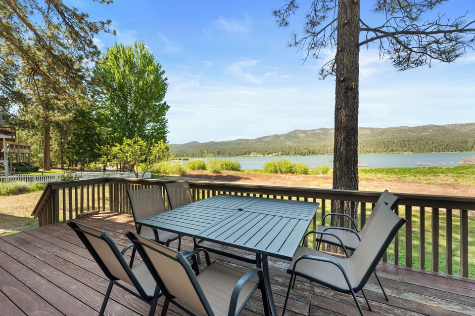 Back patio - Back patio with exterior seating, propane BBQ, and beautiful lawn with lake access and views