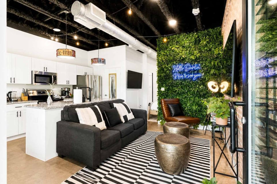Living Room: Unwind in the cozy living room with a Samsung Smart TV (Roku-loaded) and a sofa bed that converts for two extra guests.