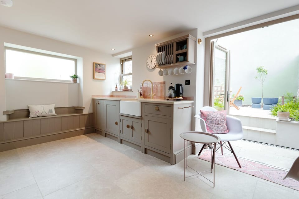 A fully equipped kitchen includes a dishwasher and washing machine for your convenience
