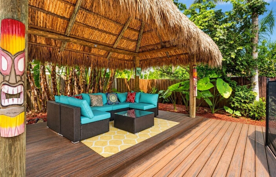 Unwind in our tropical Tiki Lounge 🌴✨ A cozy outdoor retreat perfect for relaxing, enjoying a drink, and soaking up the laid-back Florida vibes.
