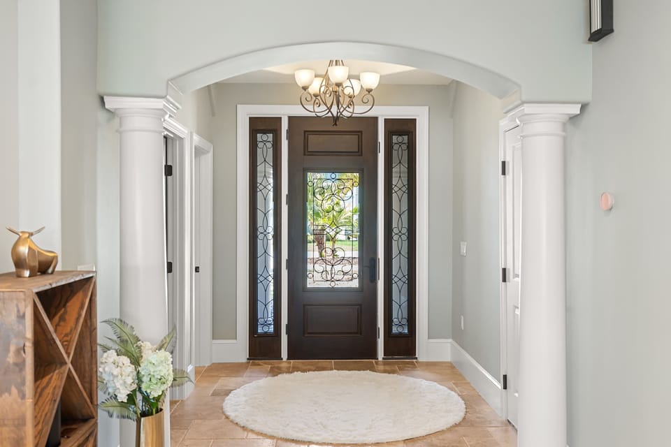A Grand Welcome Awaits – From the moment you step through the elegant arched entryway, you'll know this is no ordinary vacation home. 