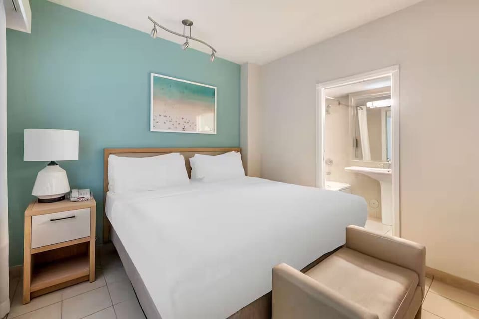 Settle in early with calm coastal colors and restful comfort.