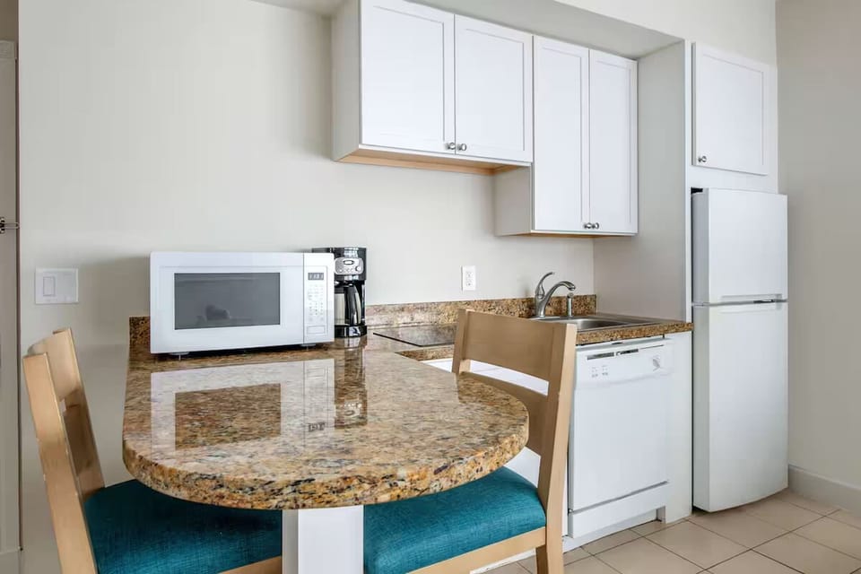 Savor easy breakfasts with kitchenette convenience and granite counter.