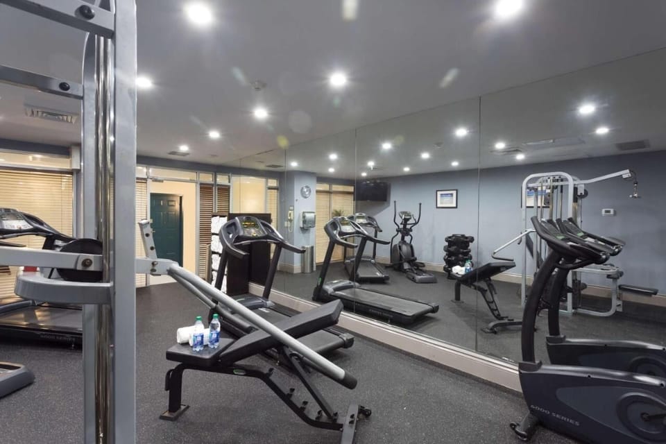 Recharge with a full workout in the mirrored fitness room.