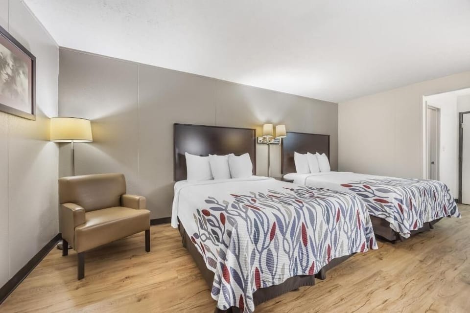 Settle into crisp linens and stretch out across two queens.