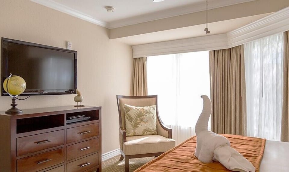 Kick back with in-room entertainment and plenty of storage.