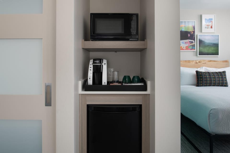 Grab a quick bite with microwave, mini-fridge, and coffee.