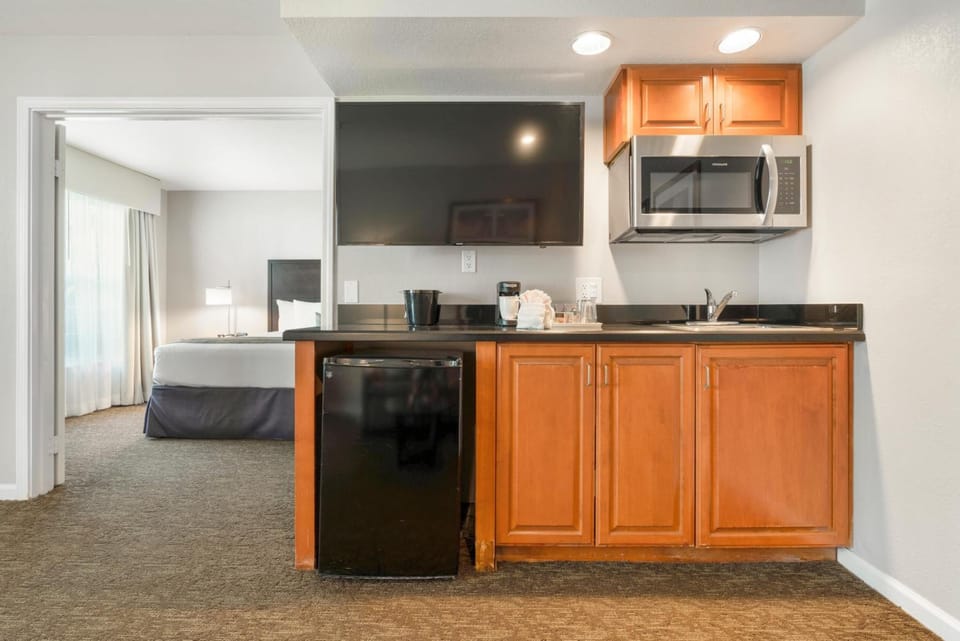 Prepare snacks easily with microwave, sink, and mini-fridge.