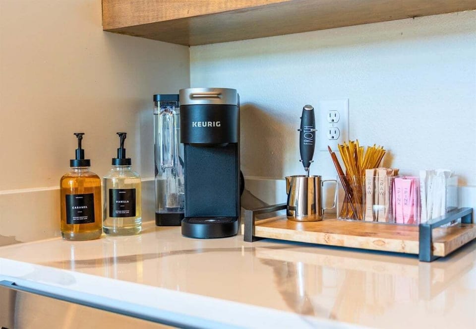 A closer look at the coffee and beverage station shows the thoughtful details that make mornings easy and evenings even better.