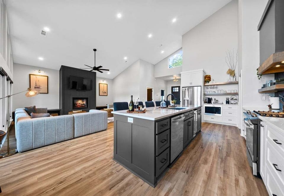 The open-concept design allows the kitchen and living areas to flow effortlessly together, making it easy to host or simply enjoy time with family.