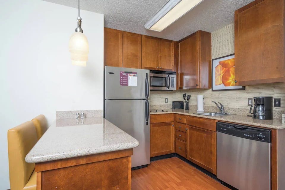 Cook effortlessly in the full kitchen with modern appliances.