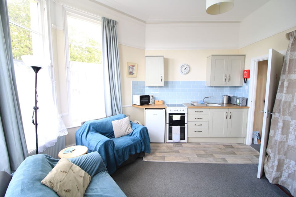 Living room with kitchen area