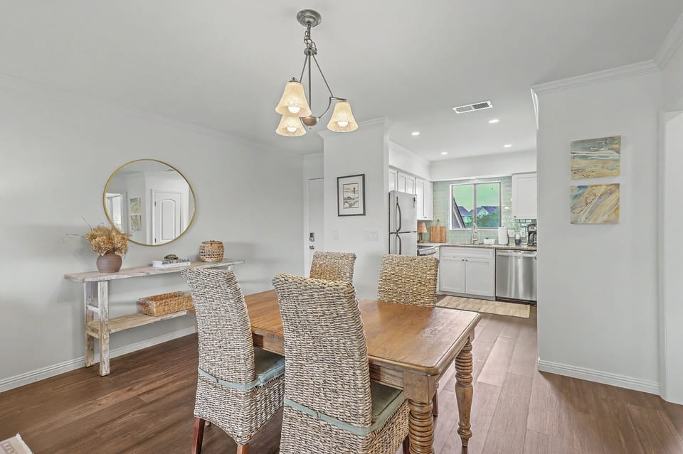 Prepare meals with ease in the fully equipped kitchen, conveniently located just steps from the dining area.