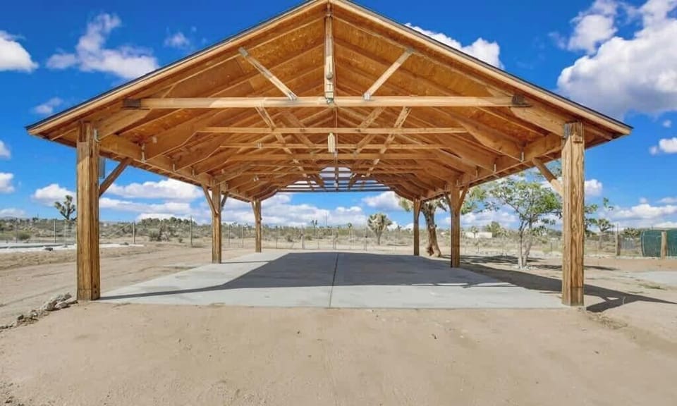 covered area perfect for parking cars or small events
