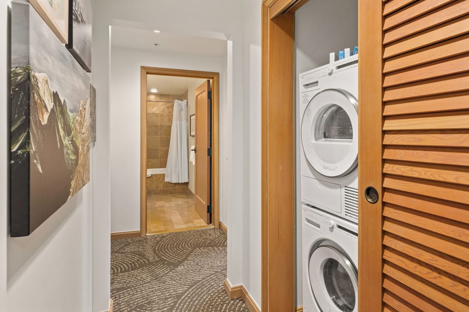 The property includes an in-unit laundry area with both a washing machine and dryer for added comfort during your visit.