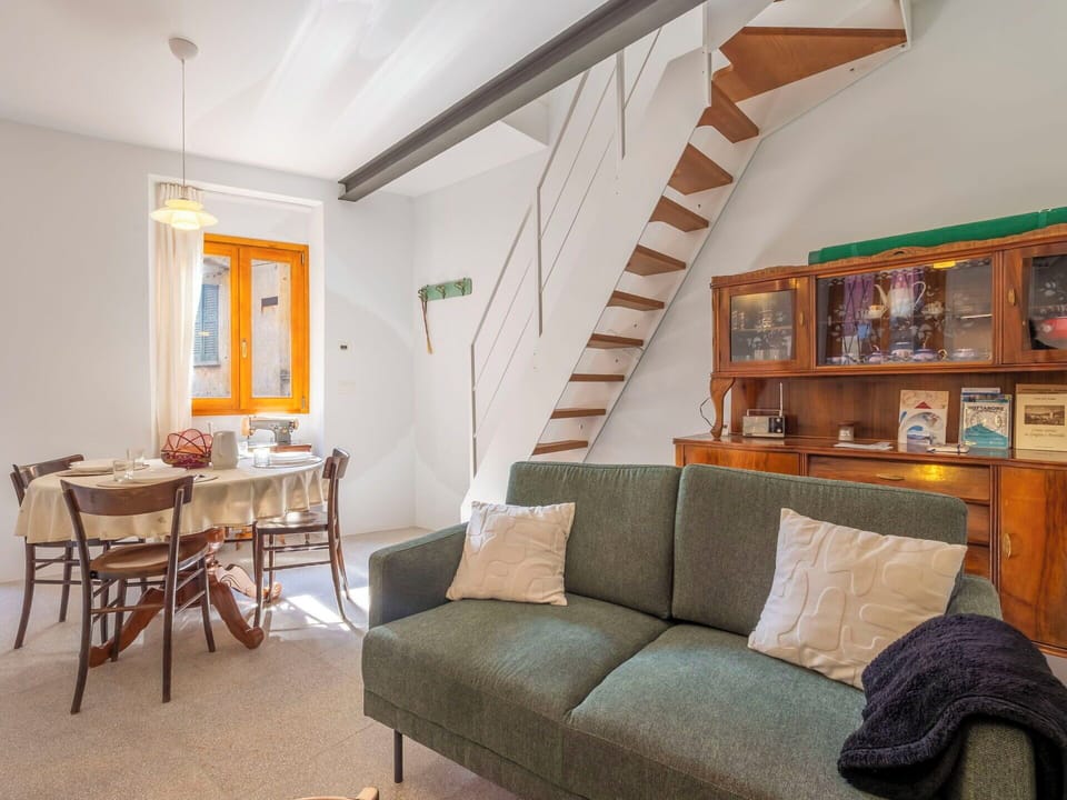 Furniture, Interior Design, Flooring, Wall, Floor, Wood, Room, Ceiling, Couch, Table