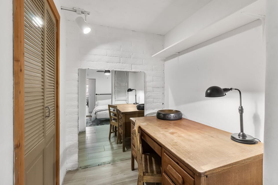 A desk + chair is provided for those that need to work remotely.