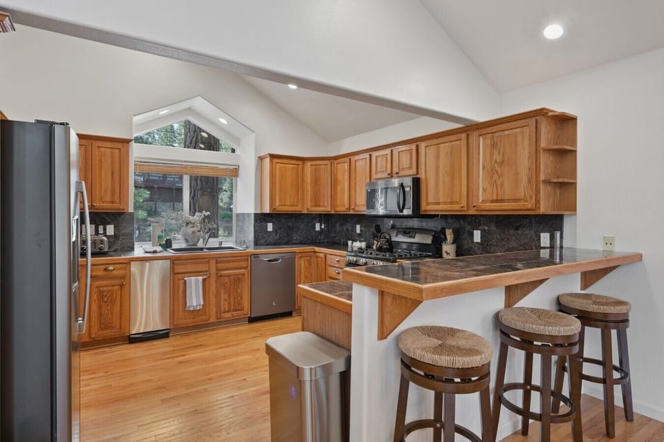 Fully stocked kitchen with gas range