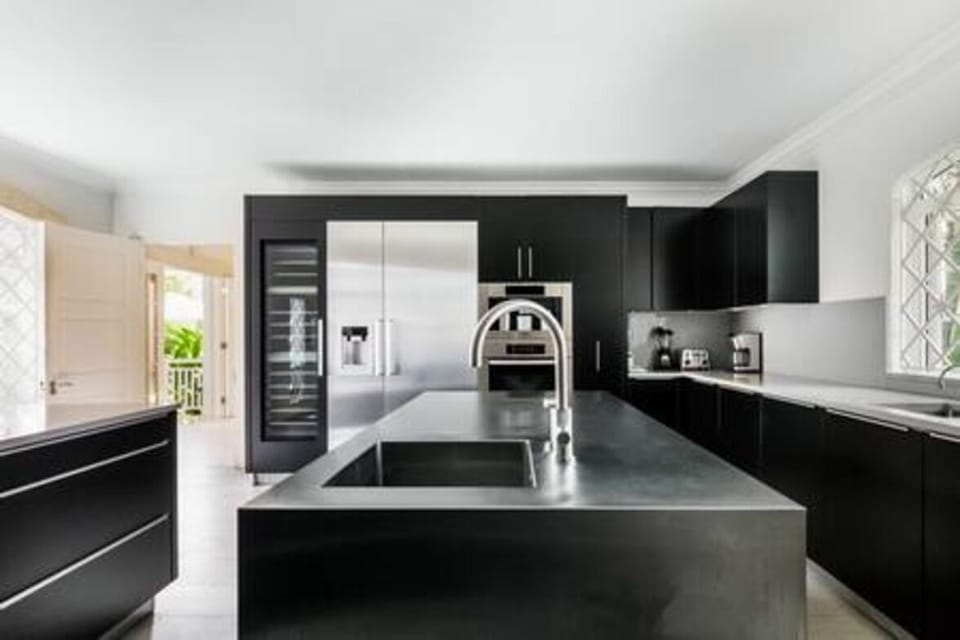 A magnificent kitchen awaits guest of Tradewinds. Fully equipped with every appliance and gadget guest could wish for, this space is perfect for any culinary enthusiast.