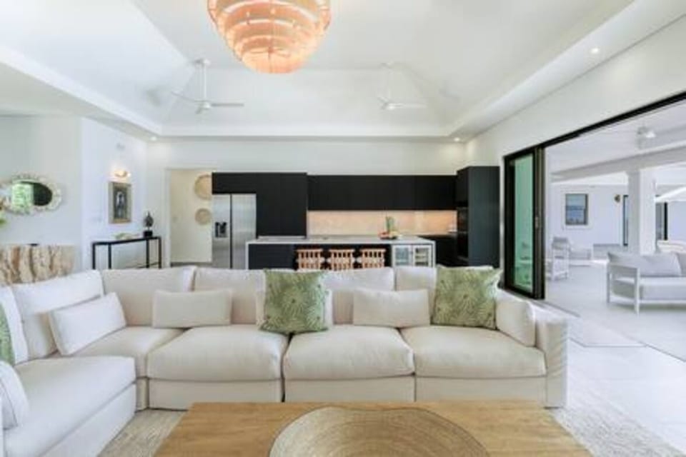 Beautifully light and airy open plan living area and kitchen, with fabulous views over the pool and sea beyond.