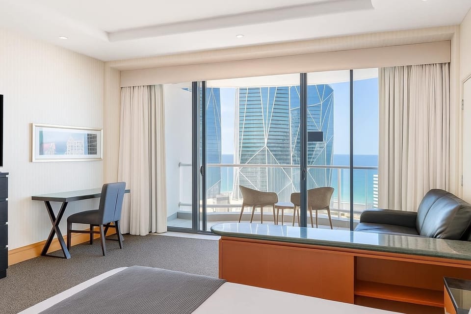 Stylish sofa, ocean views and floor-to-ceiling windows