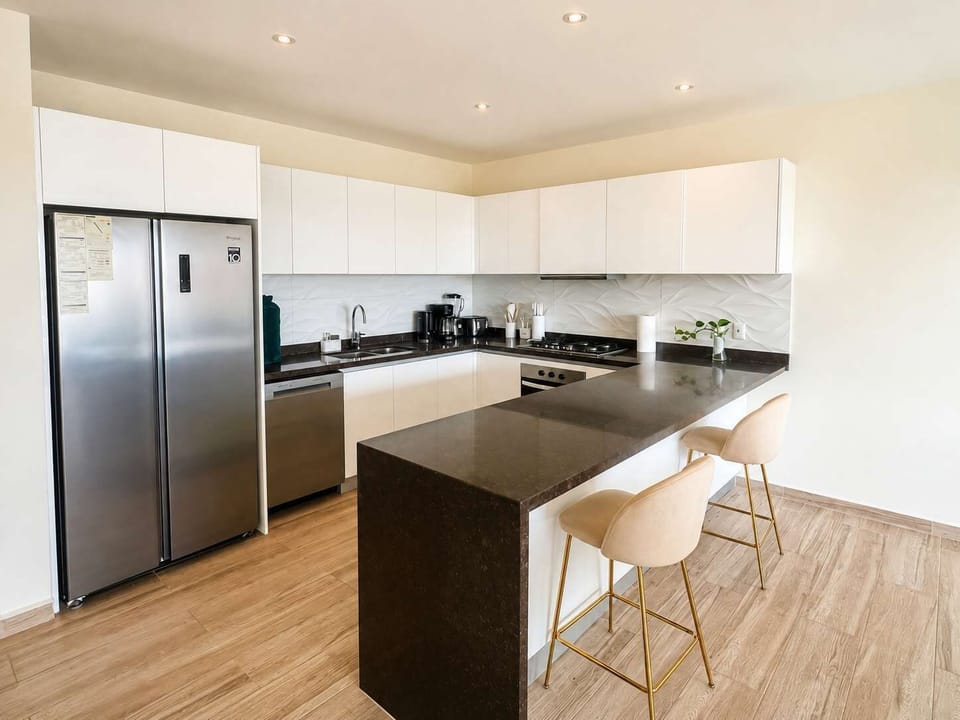Equipped kitchen with everything needed for easy meals during your stay.