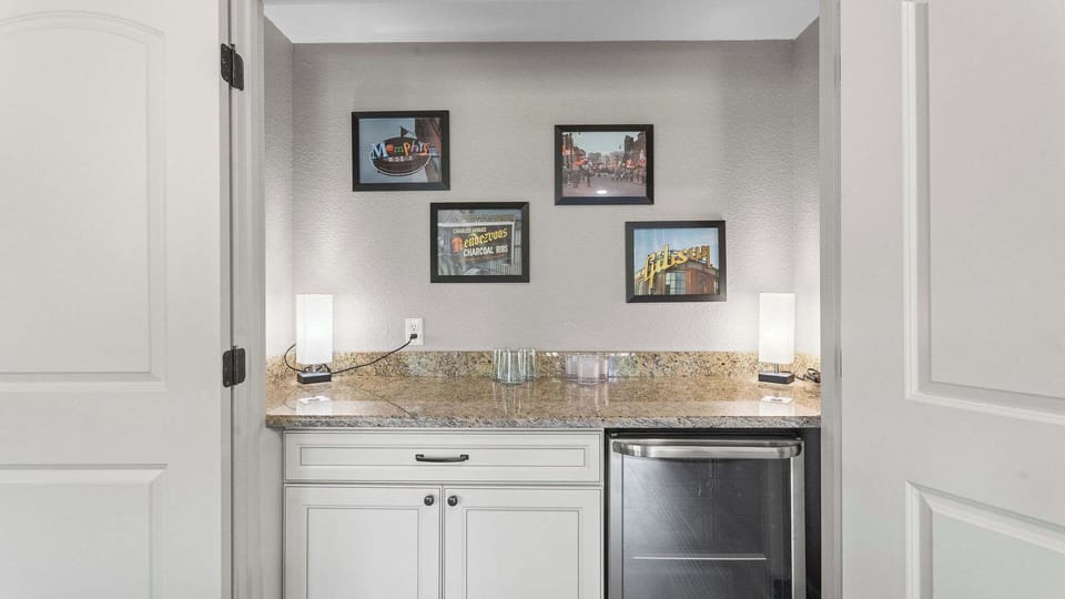 The finished basement den with bar is the ideal spot for epic movie nights​