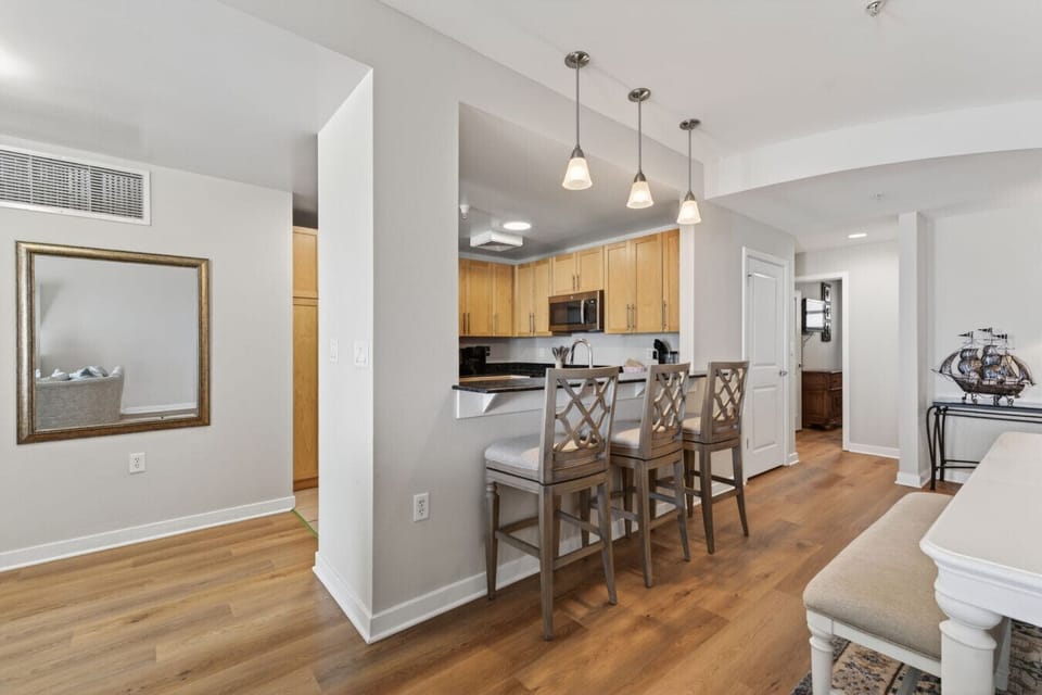 Gather around the breakfast bar, share meals at the table, and enjoy effortless vacation living in this spacious coastal retreat.