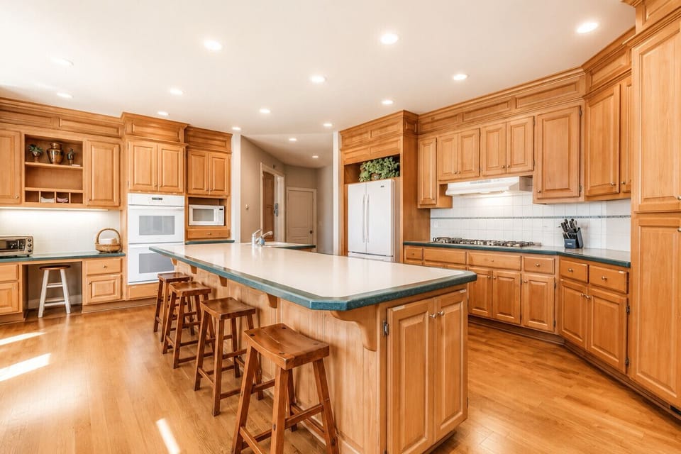 Open chef`s kitchen with large prep island and seating for gatherings