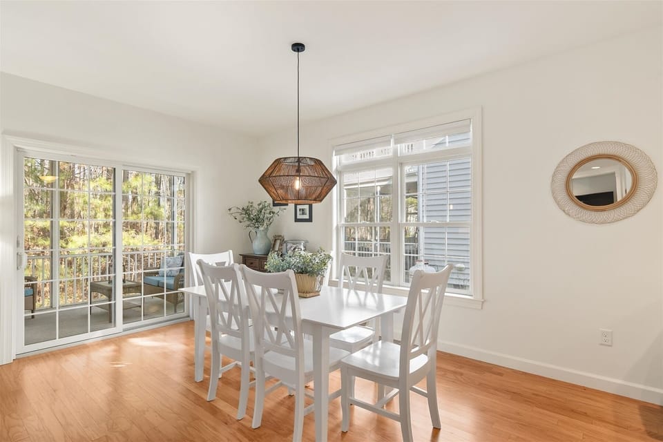 Dining space opens to screened porch