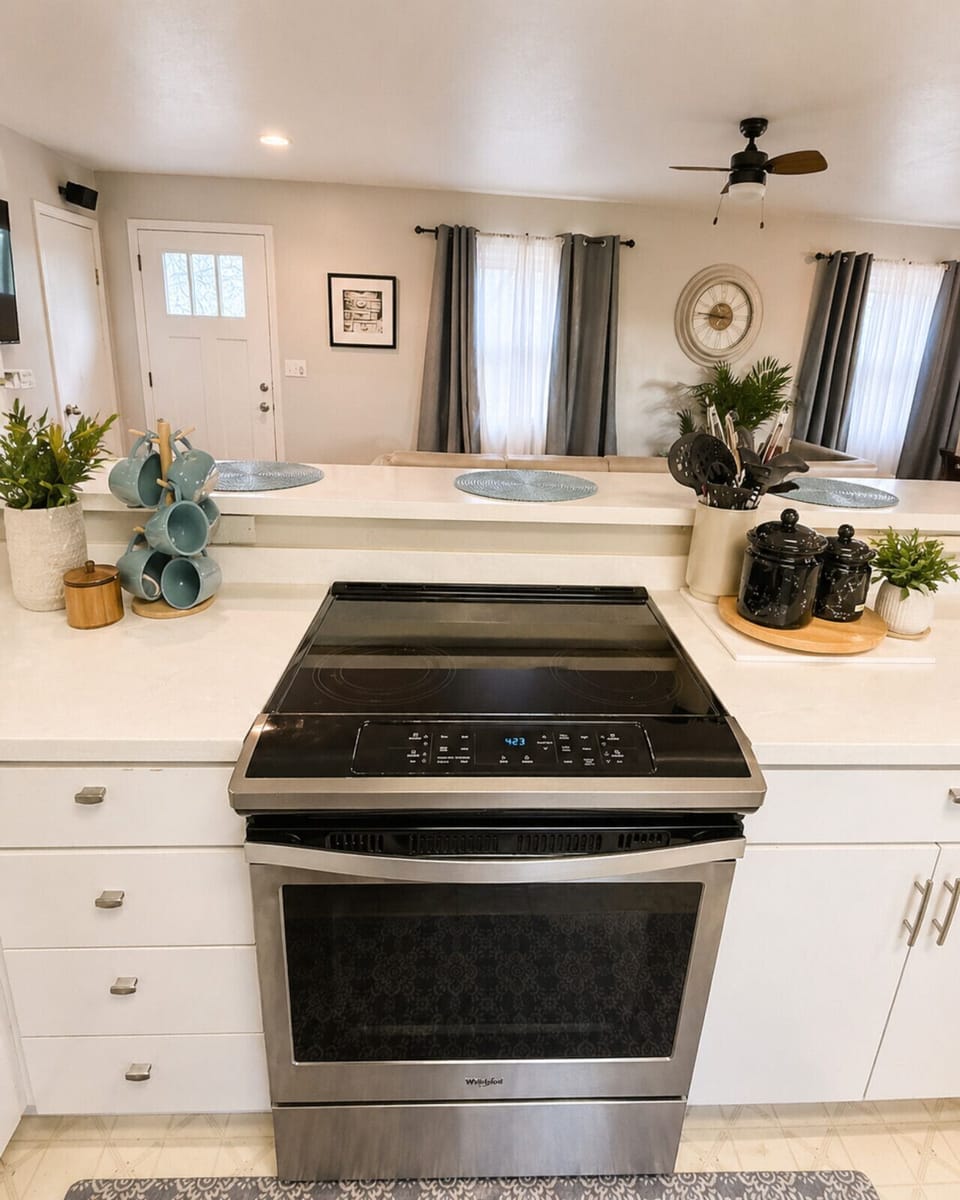 Sleek, fully equipped kitchen with modern appliances and open layout—perfect for home-cooked meals, entertaining guests, and comfortable extended stays.