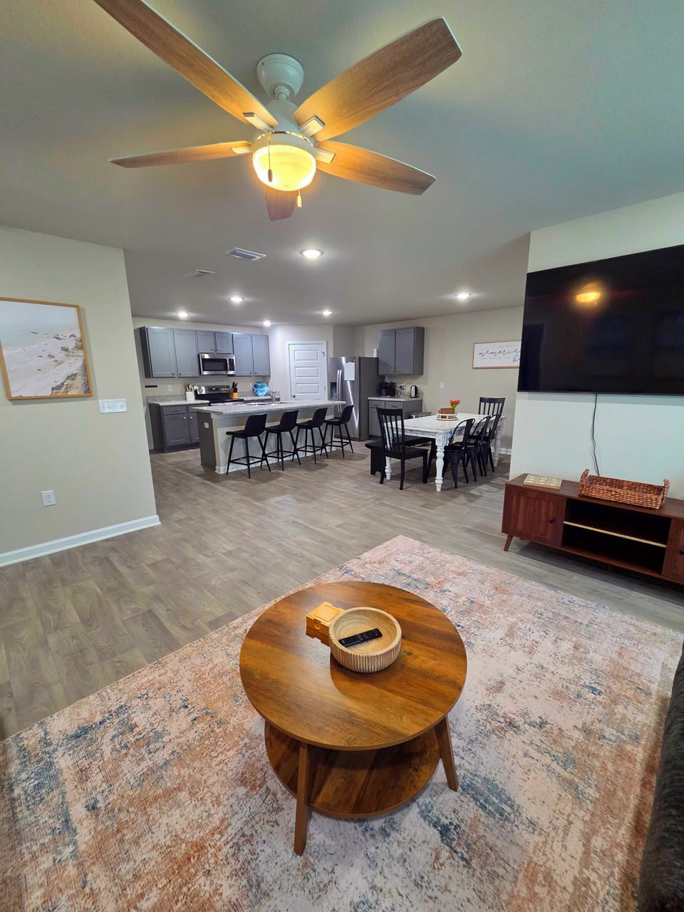 living room looking into dining room and kitchen