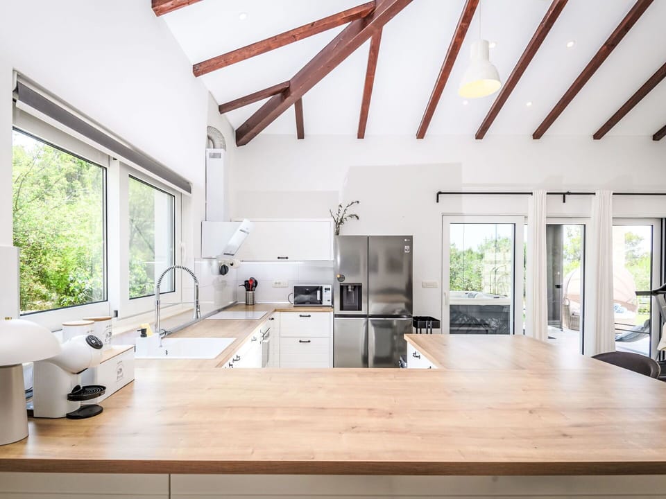 Kitchen, Countertop, Furniture, Interior Design, Flooring, Cabinetry, Wood, Kitchen Appliance, Ceiling, Floor