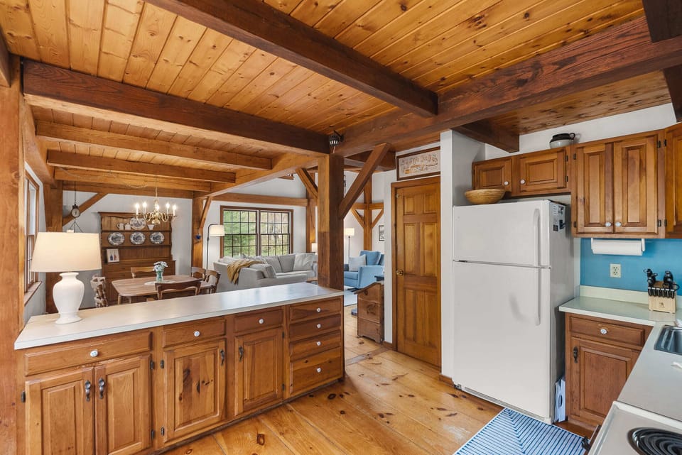 The kitchen has ample counter space and storage for meal prep.