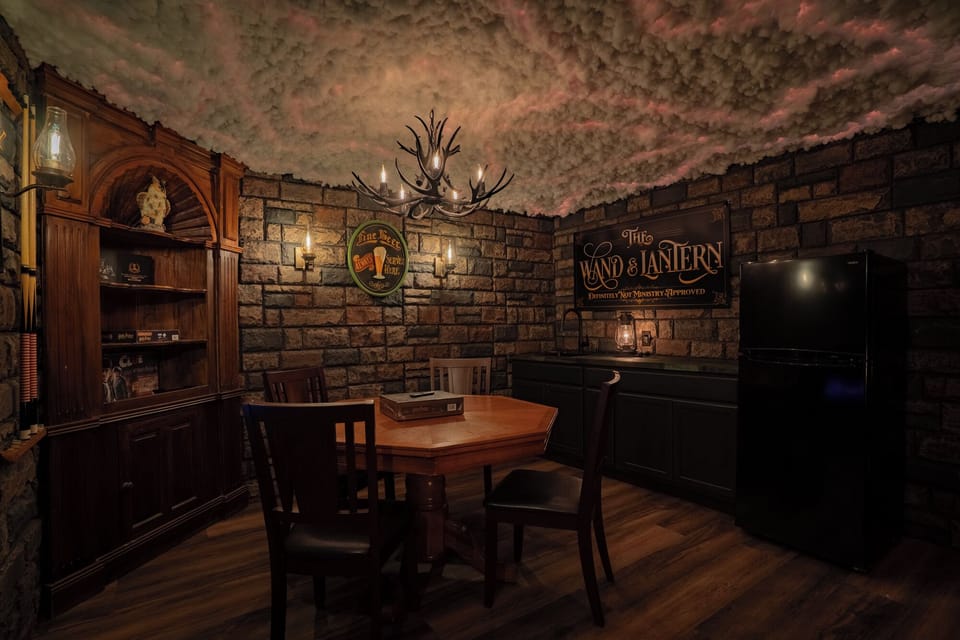 The tavern comes complete with kitchenette, 50" TV, game table, high-back wing English wing chairs, and a wide variety of complimentary games.