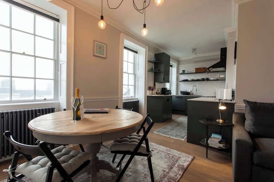 Open-planned kitchen and dining area with views of the Artisan Quarter below