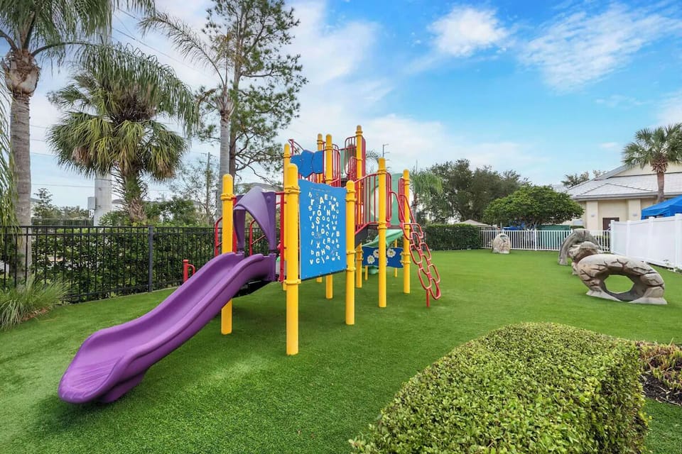Let kids burn energy on the colorful playground lawn.