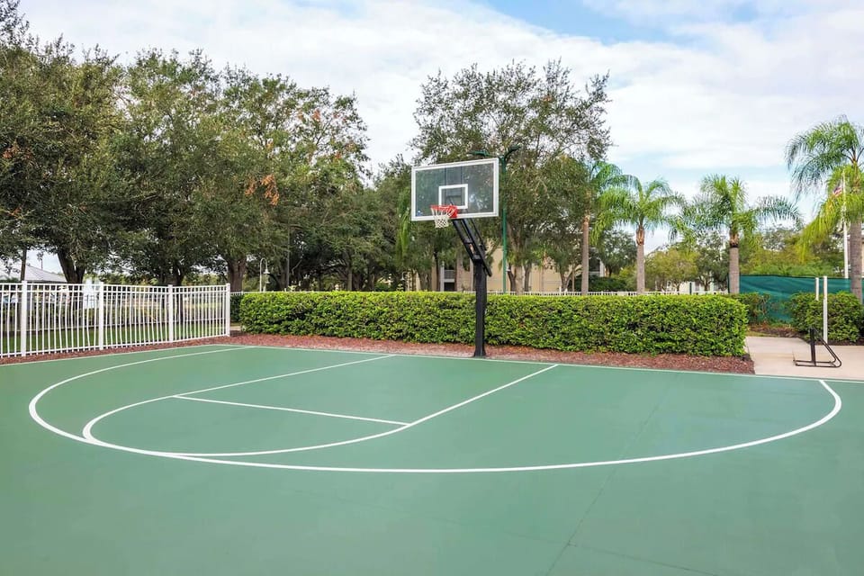 Shoot hoops anytime on the bright, well-kept half court.