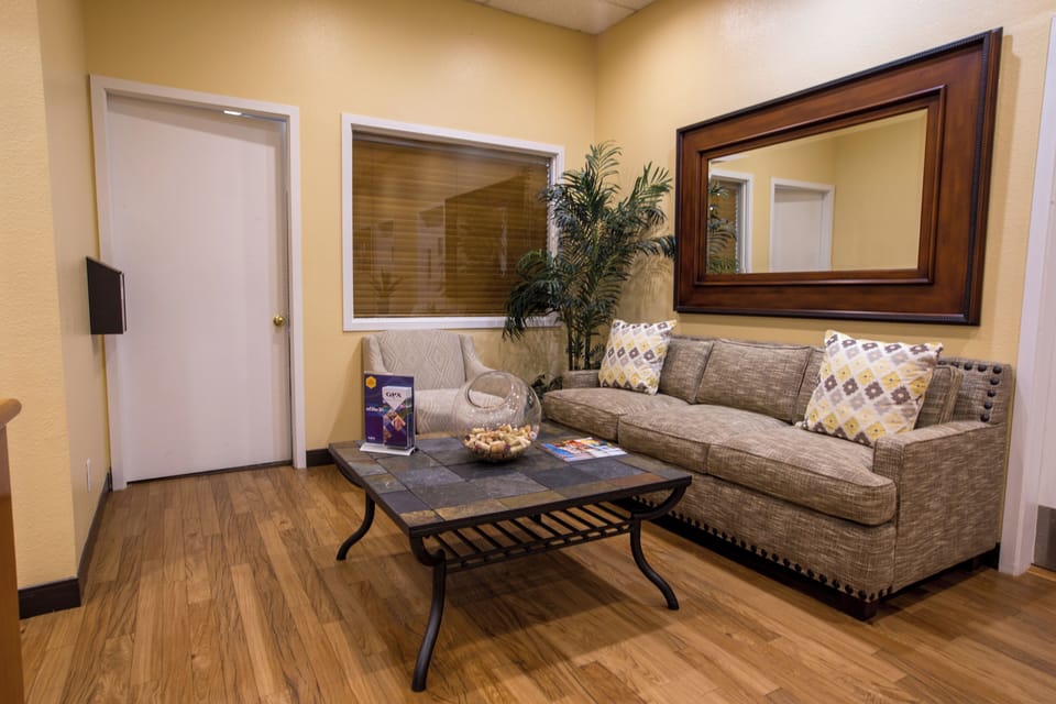 Unwind on cozy sofas in a calm, quiet lounge.